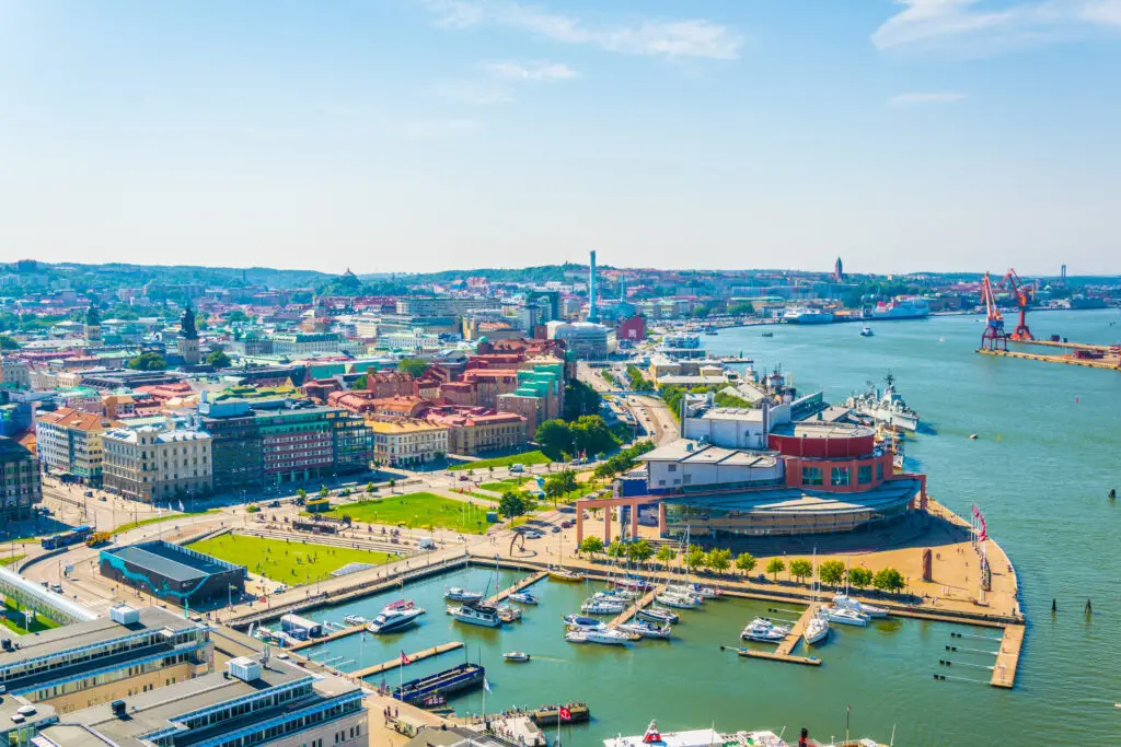 Panoramic view of Gothenburg, Sweden highlighting the vibrant waterfront, bustling cityscape, and lush greenery, ideal for tourists exploring Scandinavia.