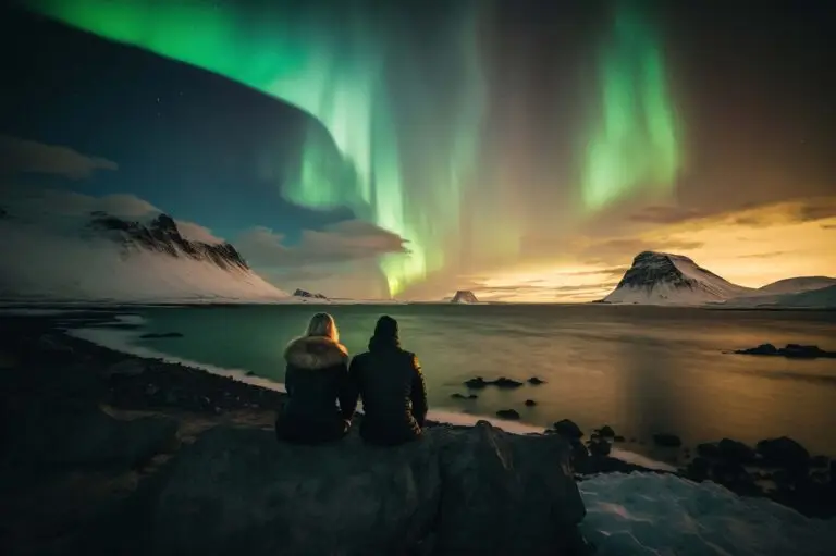 Two people sitting on a rock watching the Northern Lights over a snowy landscape in Sweden, perfect for custom tours
